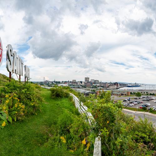 Image of Saint John sign overlooking city