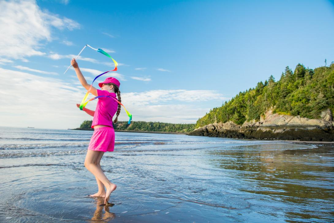 Child playing at a beach 