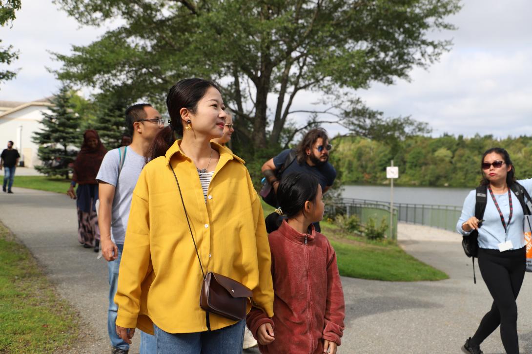 Individuals walking in park