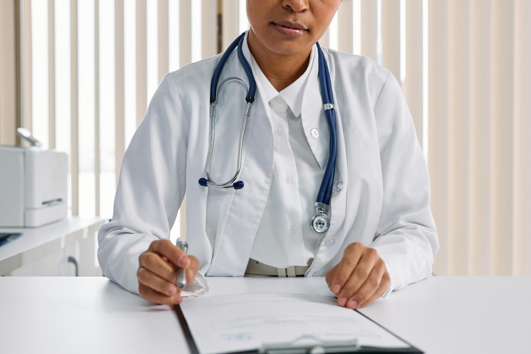 Doctor sitting at table